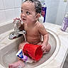 Zaylen joined the competition — help win amazing prizes! baby, child, infant, bathroom, sink, bathtub, water, faucet, bathing, wet, naked, curious, sitting, red_cup, toiletries, soap, tiles, portrait, indoors, hygiene