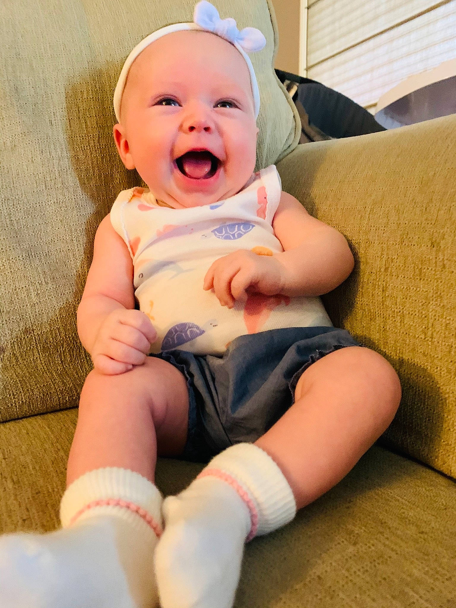 Brexleigh is registered to the contest to win money with this photo: baby, baby_toddler_clothing, cheek, comfort, eye, finger, flash_photography, fun, happy, human_body, human_leg, knee, leg, mouth, person, pink, skin, smile, thigh, thumb