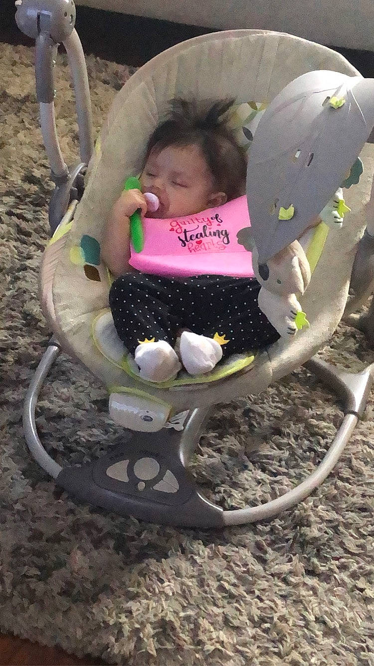 Aviana is registered to the contest to win money with this photo: baby, baby_carriage, baby_products, baby_toddler_clothing, chair, child, comfort, fashion_accessory, fun, garden, grass, leisure, magenta, outdoor_furniture, person, plant, recreation, sitting, swing, toddler