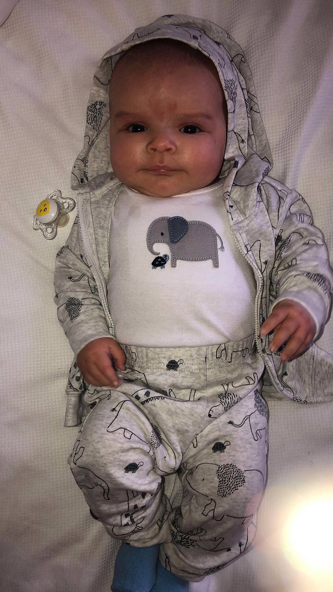 Kyren is registered to the contest to win money with this photo: baby, baby_products, baby_toddler_clothing, cheek, child, collar, comfort, eye, gesture, happy, linens, nose, outerwear, pattern, person, skin, sleeve, t_shirt, textile, toddler