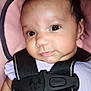 Ava Sherman is registered to the contest to win money with this photo: baby, black_harness, car_seat, child, close_up, clothing, cute, expression, face, harness, head, indoors, infant, person, pink_background, portrait, safety, seatbelt, smile, young