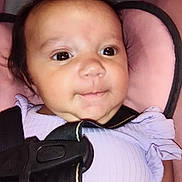 Ava Sherman joined the competition — help win amazing prizes! baby, car_seat, child, child_seat, closeup, cute, expression, eyes, face, hair, head, indoor, infant, padded_seat, purple_clothing, ribbons, safety, seatbelt, sitting, skin