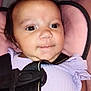 baby, car_seat, child, child_seat, closeup, cute, expression, eyes, face, hair, head, indoor, infant, padded_seat, purple_clothing, ribbons, safety, seatbelt, sitting, skin