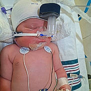 Kayden joined the competition — help win amazing prizes! newborn, baby, hospital, medical_equipment, monitoring_wires, nasal_cannula, cap, sleeping, infant, healthcare, towel, bed, medical_tape, iv_line, patient, child, skin, monitor_pads, hospital_bed, medical_care