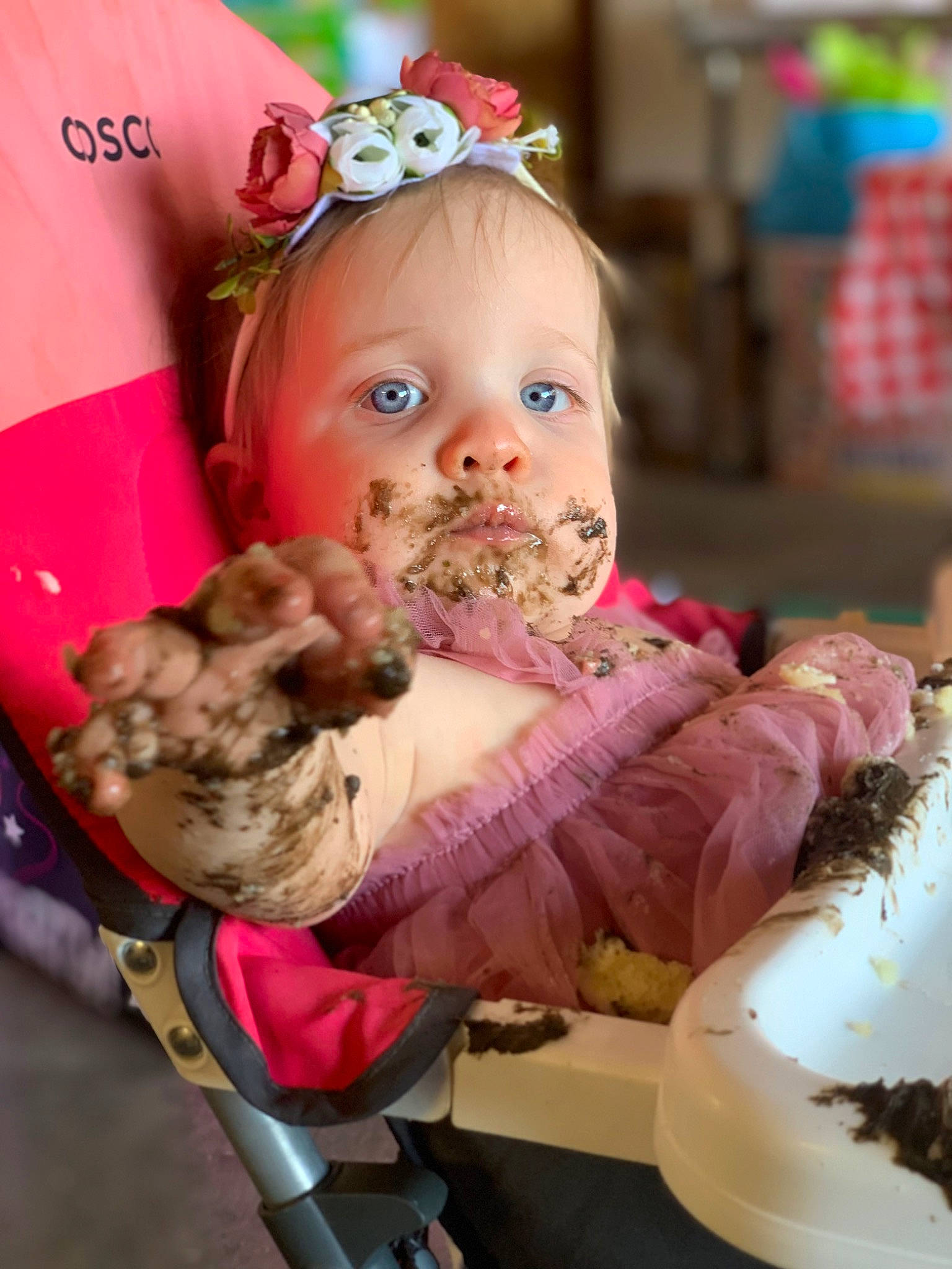 Leiah-rose is registered to the contest to win money with this photo: baby, baby_products, baby_toddler_clothing, child, dress, event, fashion_accessory, fun, happy, headband, headpiece, icing, jewellery, party_supply, peach, person, pink, plate, sitting, sweetness