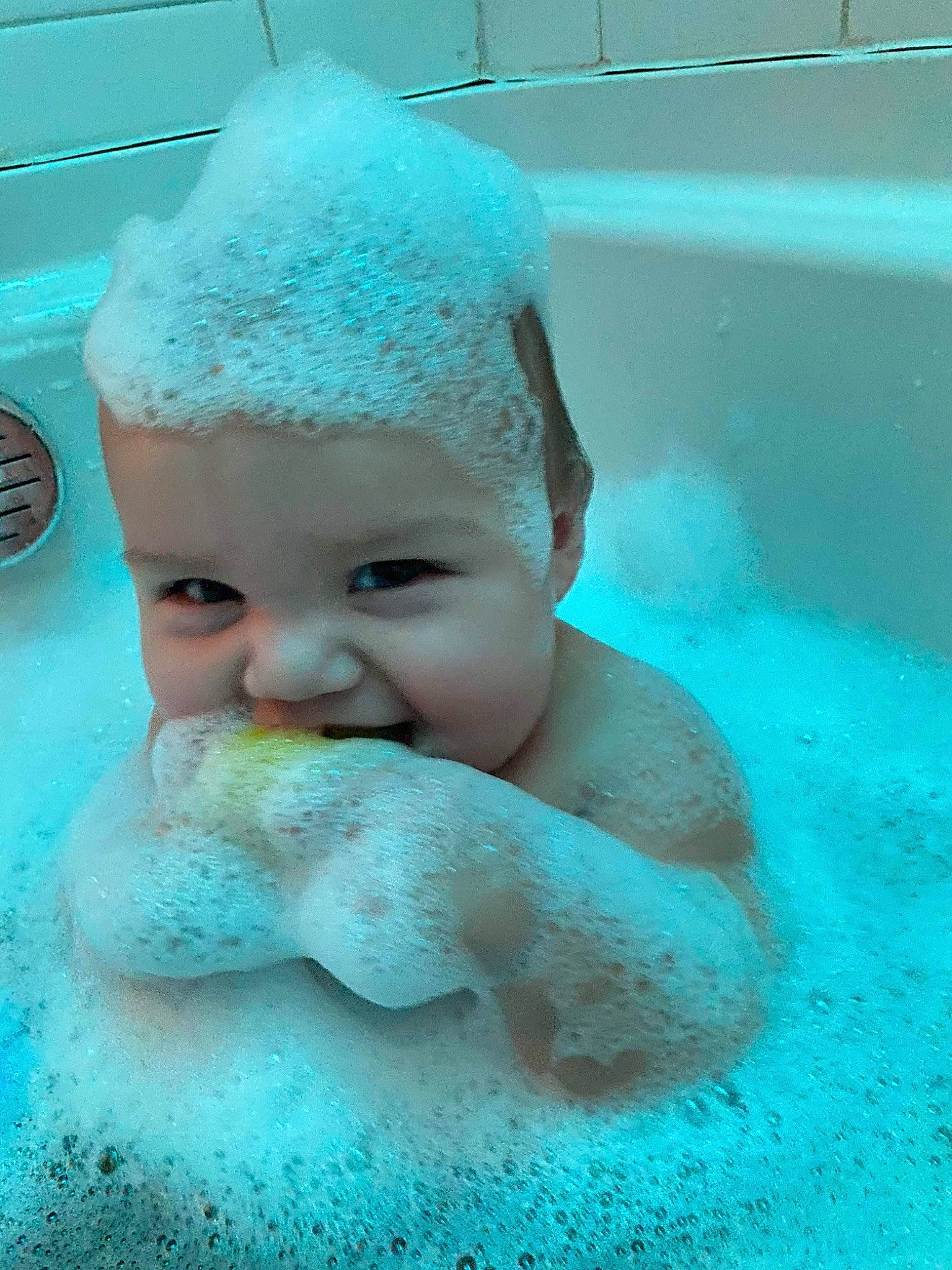 Julian joined the competition — help win amazing prizes! aqua, baby, bathing, blue, cap, child, face, fashion_accessory, foam, fun, grass, happy, leisure, person, plumbing_fixture, smile, swimming_pool, toddler, vacation, water