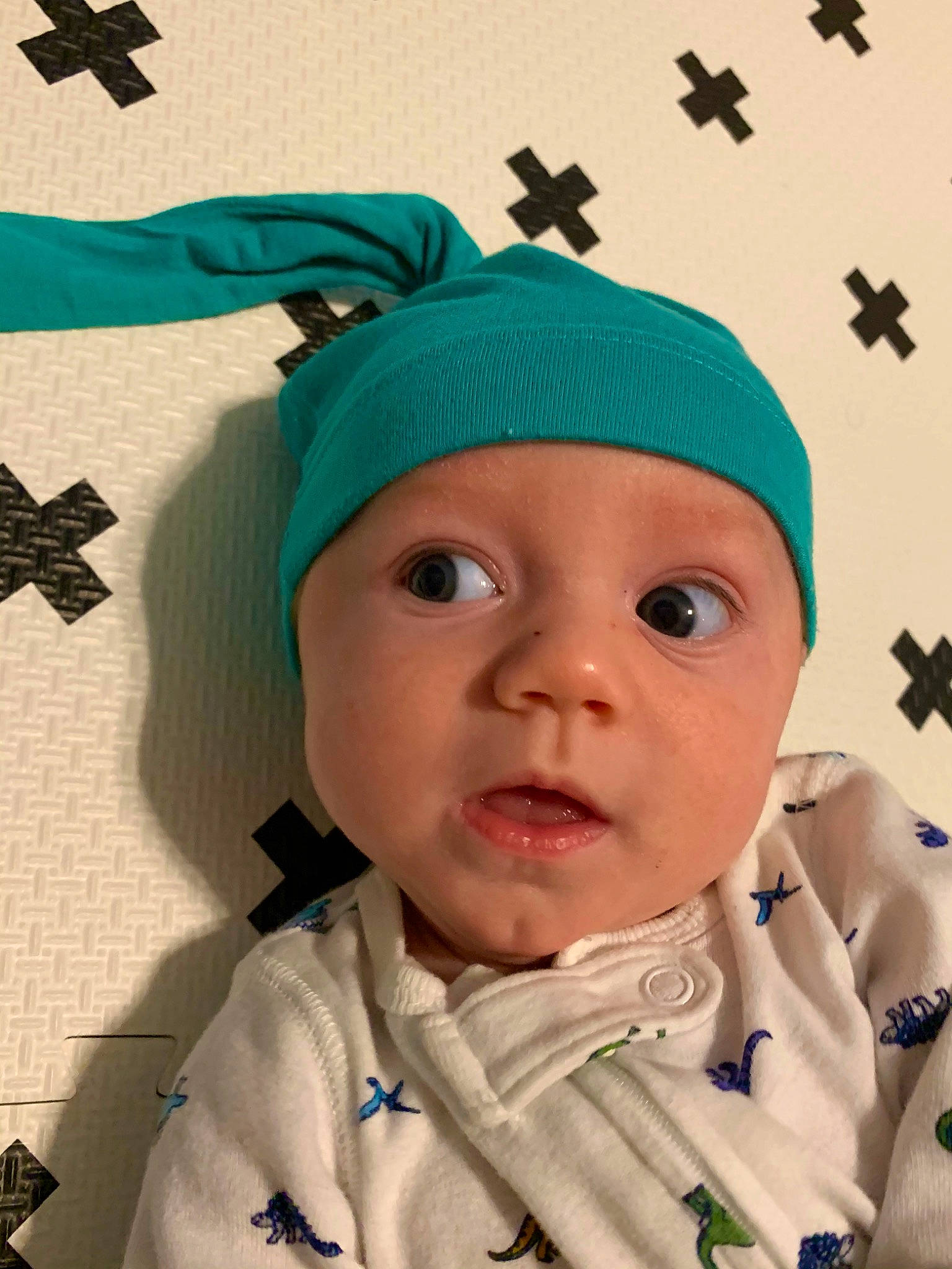 Randall joined the competition — help win amazing prizes! baby, cheek, child, cool, costume_accessory, ear, face, fashion_accessory, forehead, green, hat, head, headgear, person, surprise, toddler
