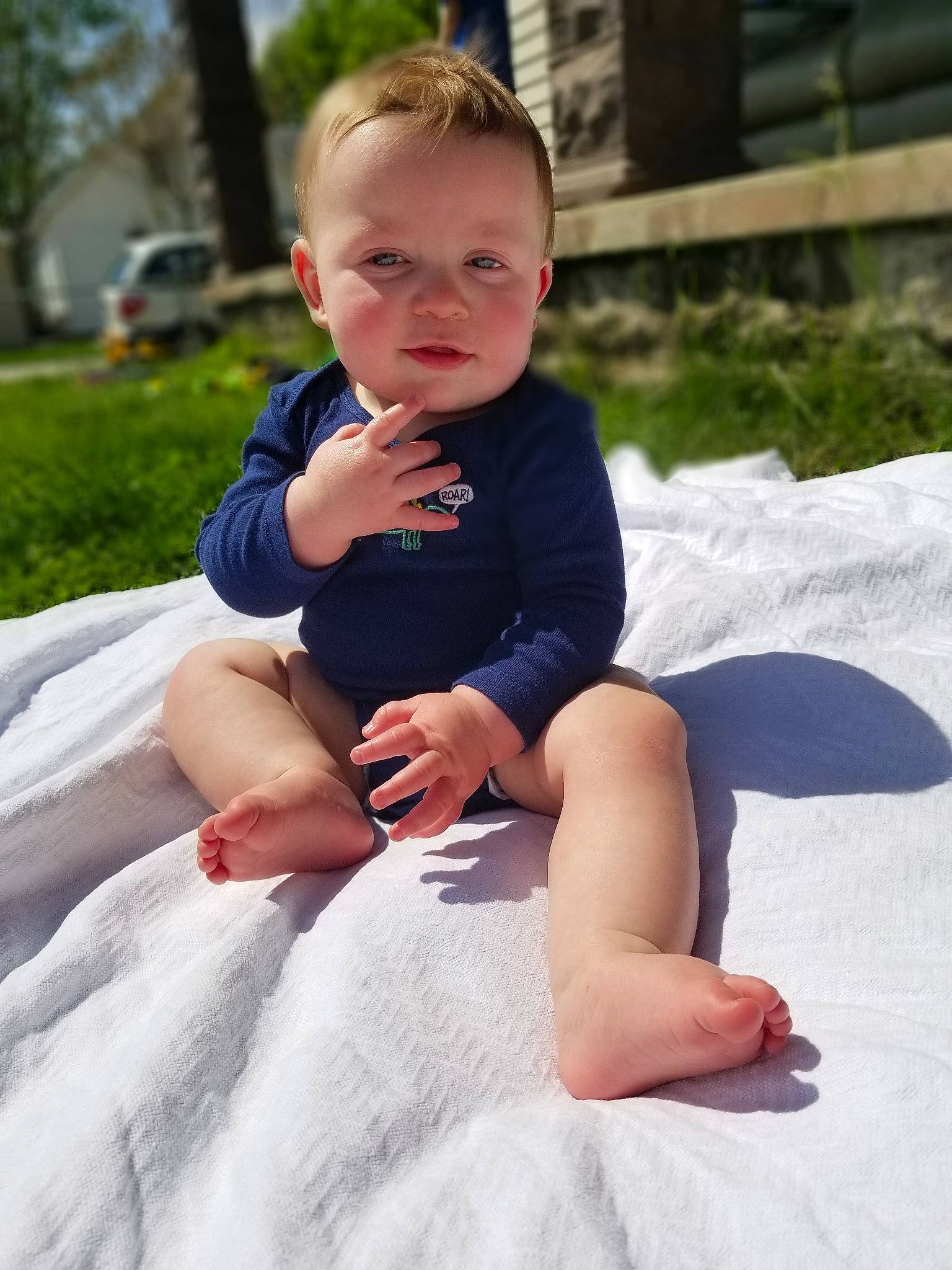 Rayland is registered to the contest to win money with this photo: baby, child, finger, leg, leisure, person, sitting, summer, toddler, vacation