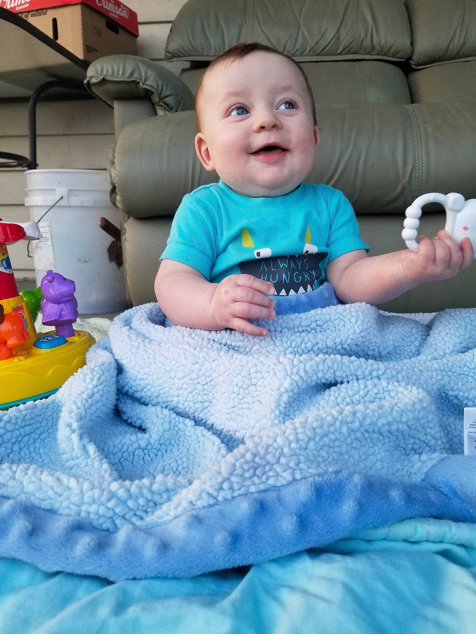 Rayland joined the competition — help win amazing prizes! baby, bedding, blanket, blue, cheek, child, linens, person, play, product, room, skin, smile, textile, toddler, vacation