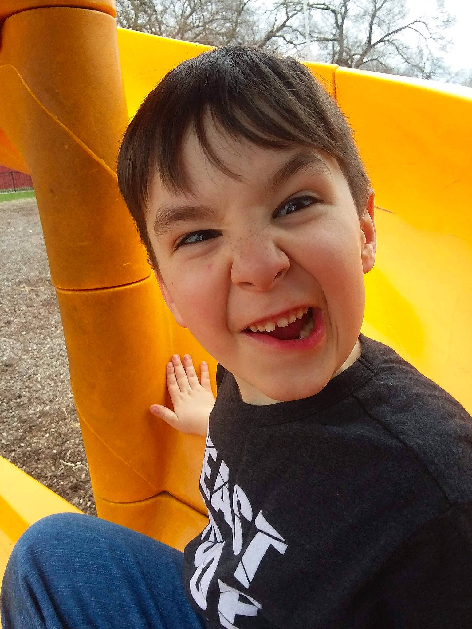 Noah joined the competition — help win amazing prizes! anger, child, face, facial_expression, finger, fun, happy, joy, leisure, outdoor_play_equipment, person, play, playground, recreation, smile, toddler, tooth, yellow