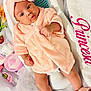 baby, baby_care, bathtub, child, cute, flower, headwrap, indoors, infant, newborn, pink, portrait, princess, relaxing, robe, sitting, skincare, soft_fabric, towel, white