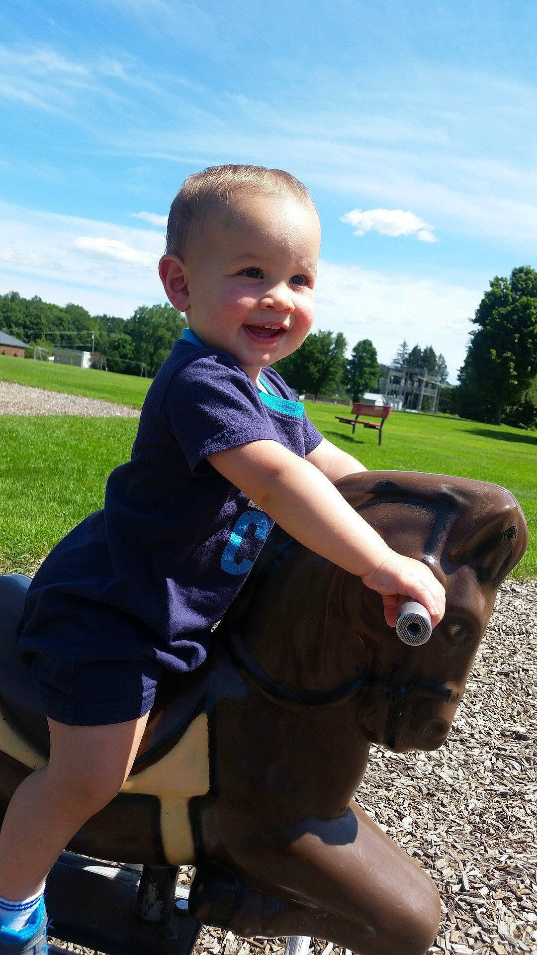 Amy joined the competition — help win amazing prizes! car, child, day, footwear, fun, grass, person, plant, play, recreation, shoe, sitting, smile, summer, toddler, tree, vacation, vertebrate