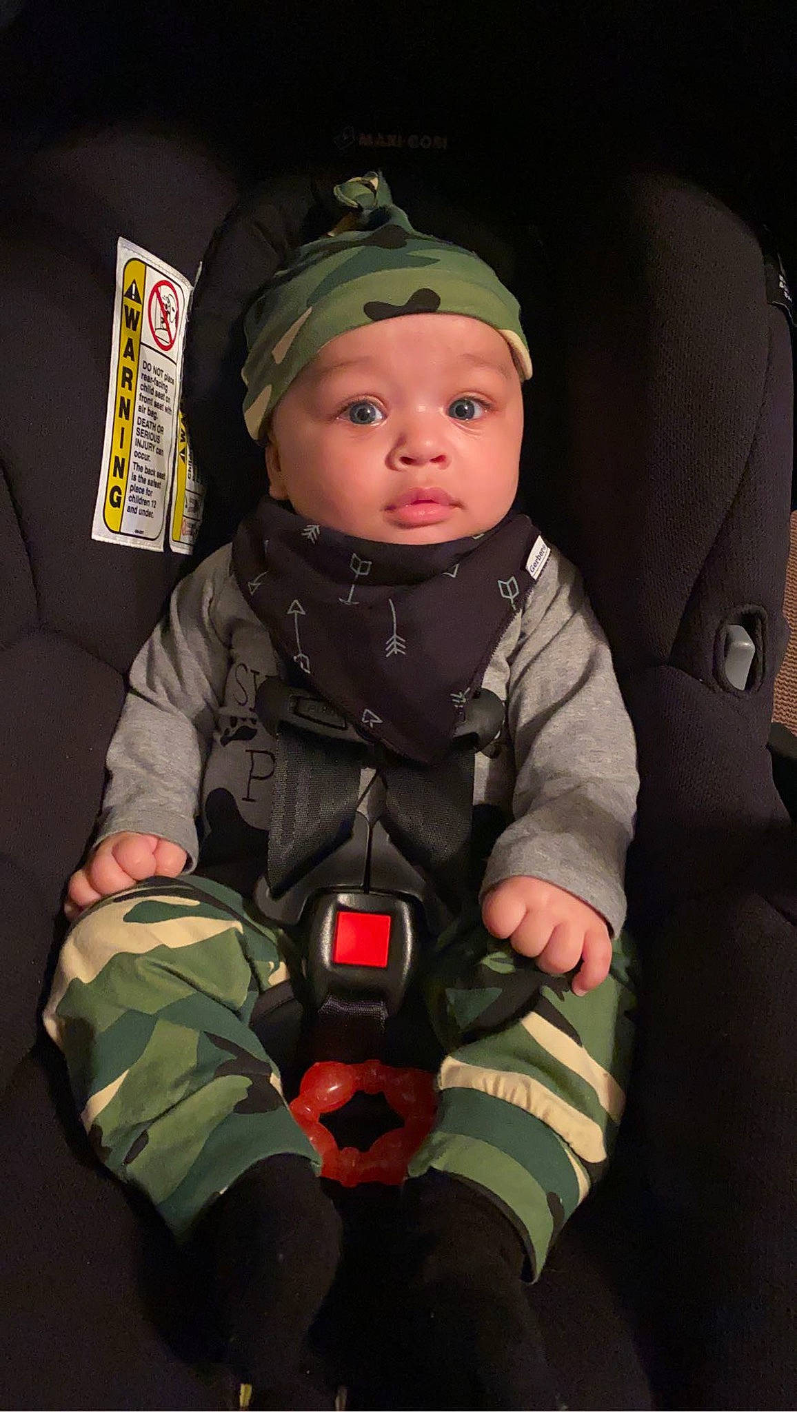 Davion is registered to the contest to win money with this photo: baby, baby_toddler_clothing, baseball_cap, camouflage, cap, car_seat, cheek, child, comfort, fun, glove, headwear, military_camouflage, military_uniform, outerwear, pattern, person, personal_protective_equipment, sleeve, soldier