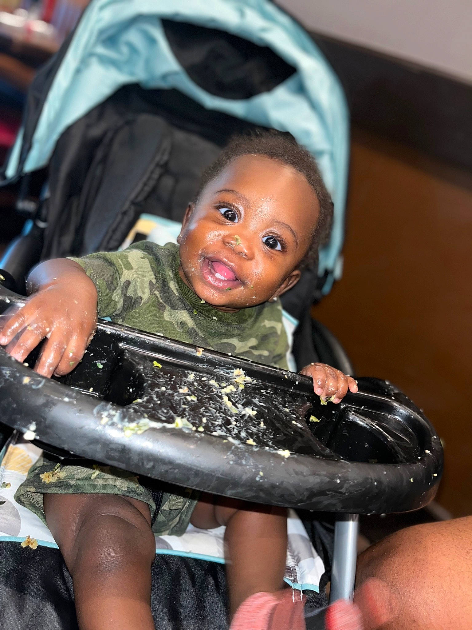 Randell is registered to the contest to win money with this photo: action_figure, black_hair, carmine, child, event, fashion_accessory, finger, flash_photography, fun, gesture, glove, jewellery, metal, nail, person, personal_protective_equipment, sitting, thigh, thumb, toddler