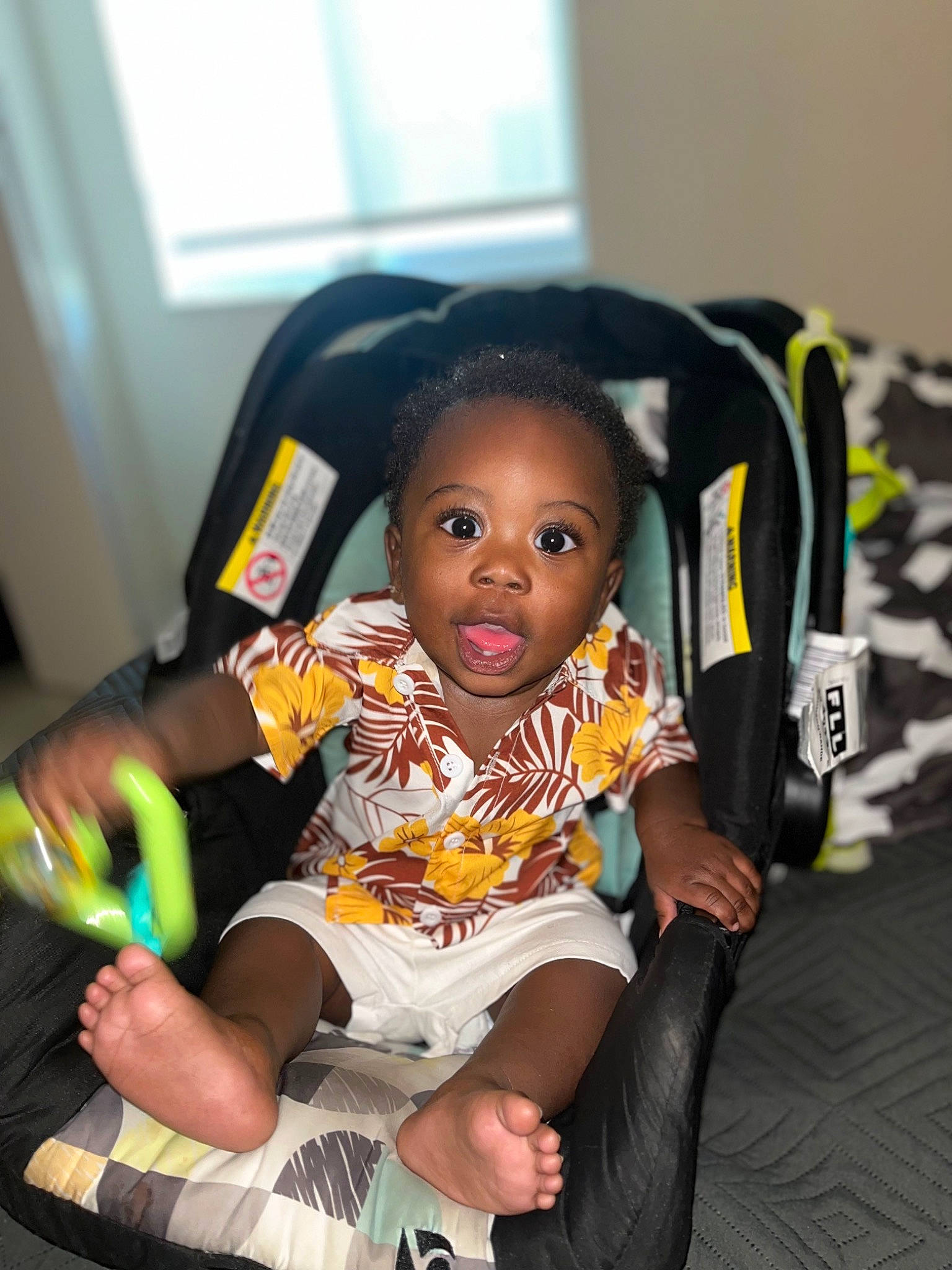 Randell is registered to the contest to win money with this photo: baby, baby_products, baby_toddler_clothing, bag, chair, child, comfort, fashion_accessory, fun, happy, human_leg, lap, person, room, sitting, sock, thigh, toddler, vacation