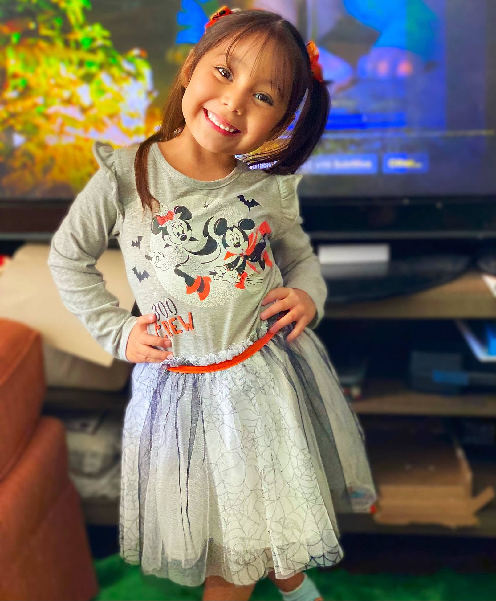 Leilani is registered to the contest to win money with this photo: child, day_dress, dress, event, eye, face, facial_expression, fashion_design, formal_wear, fun, hair, hairstyle, happy, head, joy, one_piece_garment, person, skin, sleeve, smile