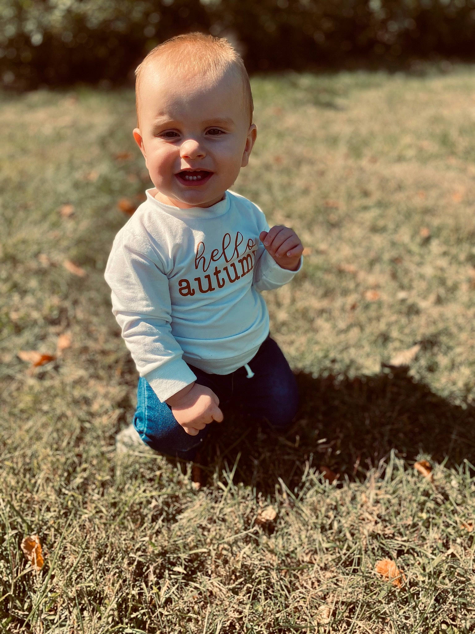 Alec is registered to the contest to win money with this photo: agriculture, baby, baby_toddler_clothing, child, field, flash_photography, fun, grass, grassland, happy, joy, landscape, mammal, people_in_nature, person, plant, sitting, smile, soil, sunlight