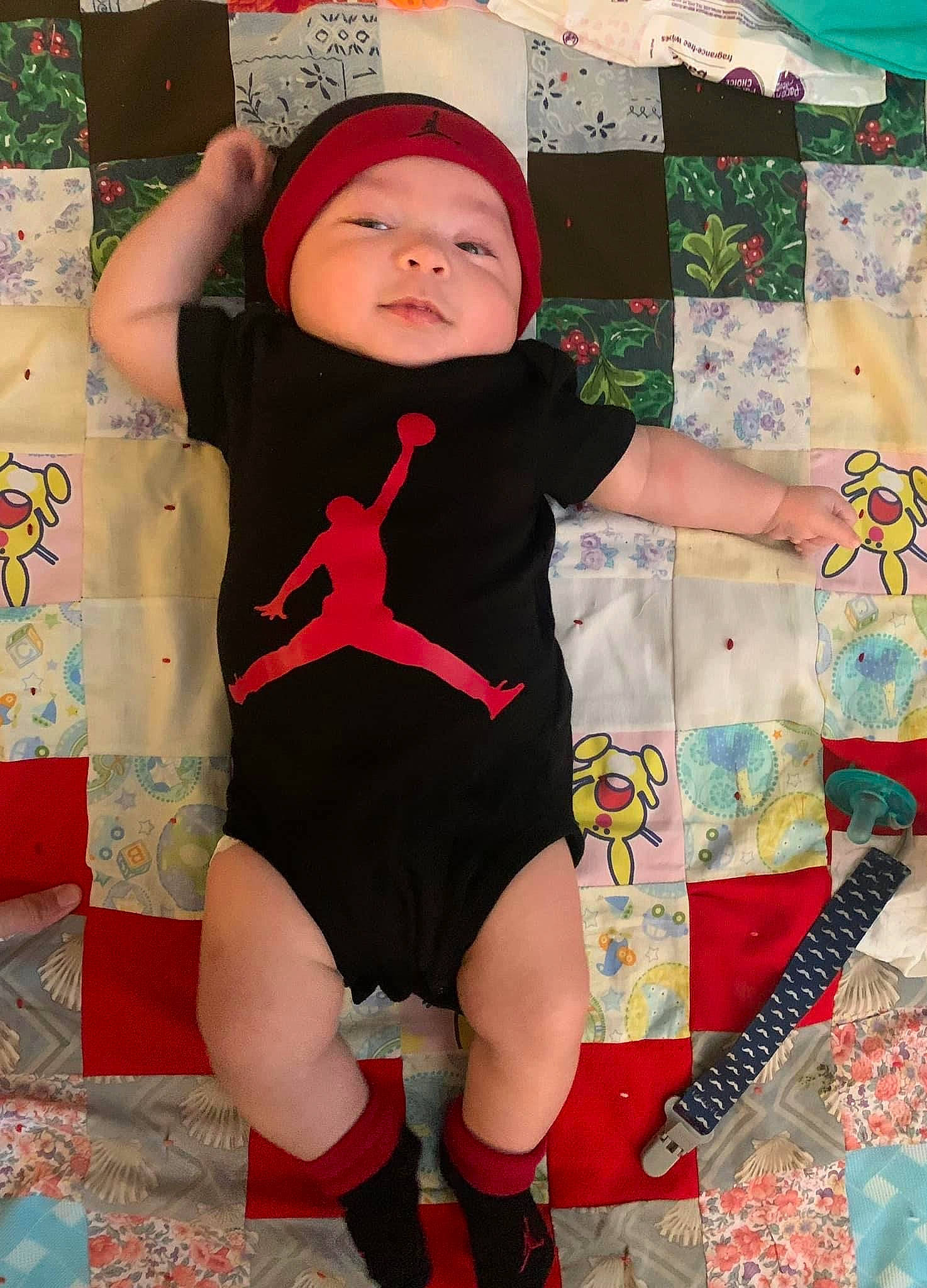 Gabriel is registered to the contest to win money with this photo: baby, baby_toddler_clothing, baseball_cap, cap, carmine, child, fun, hat, headwear, human_body, human_leg, knee, linens, pattern, person, pink, play, sleeve, t_shirt, textile