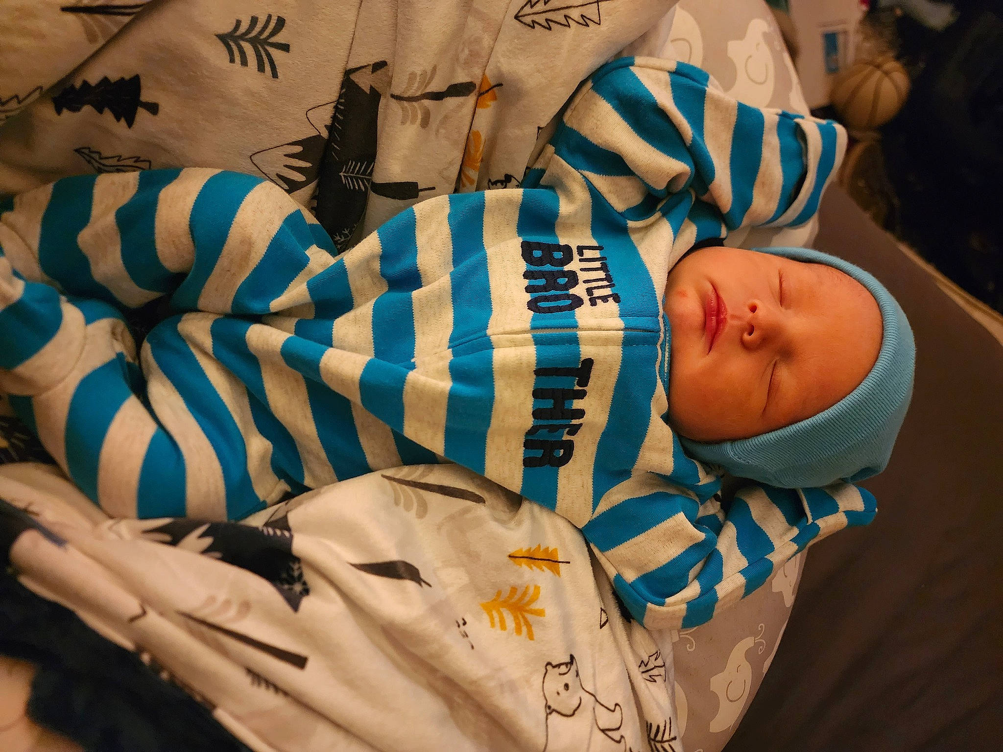 Josiah joined the competition — help win amazing prizes! baby, baby_products, baby_sleeping, baby_toddler_clothing, bedtime, child, comfort, elbow, electric_blue, event, gesture, hat, human_leg, linens, nap, pattern, person, room, sleeve, textile