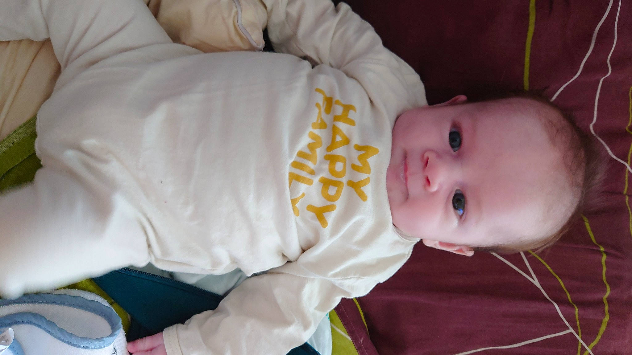 Shawn participe au concours pour gagner de l'argent avec cette photo : baby, baby_products, baby_safety, baby_toddler_clothing, cheek, child, comfort, eye, facial_expression, happy, mouth, nose, person, room, sitting, skin, sleeve, smile, textile, toddler