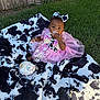 Infinity is registered to the contest to win money with this photo: baby, child, cake, pink_dress, tutu, flower, bow, blanket, cow_print, grass, outdoor, fence, happy, messy, frosting, celebration, cute, sitting, portrait, one_year_old