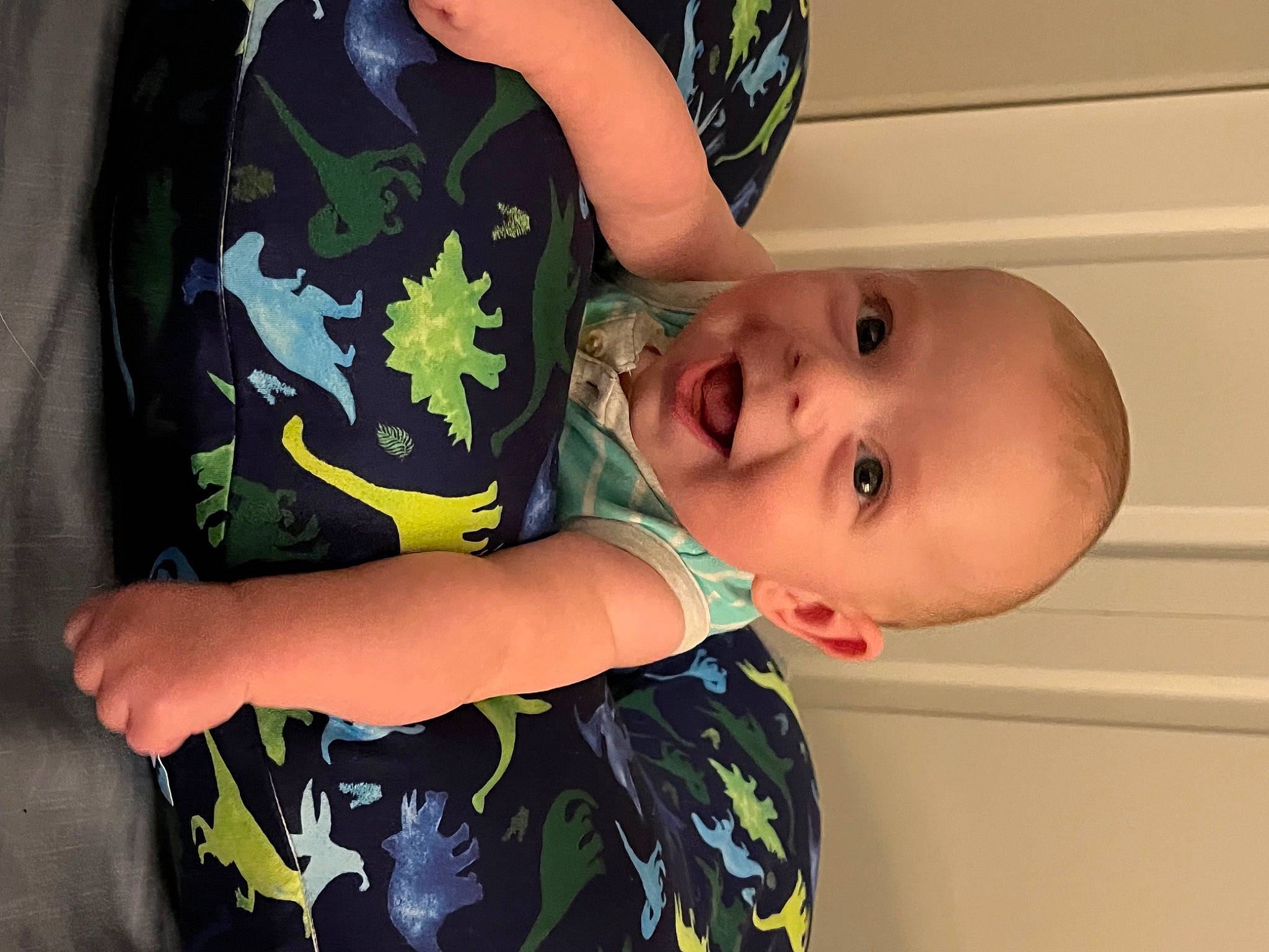 Benny is registered to the contest to win money with this photo: baby, baby_toddler_clothing, cheek, child, elbow, finger, gesture, hand, happy, head, mouth, neck, pattern, person, product, skin, sleeve, smile, t_shirt, toddler