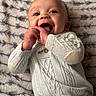 Micah joined the competition — help win amazing prizes! baby, infant, smile, happy, knitwear, sweater, blanket, texture, closeup, face, child, cute, joy, portrait, candid, soft, pattern, warm, indoor, cozy