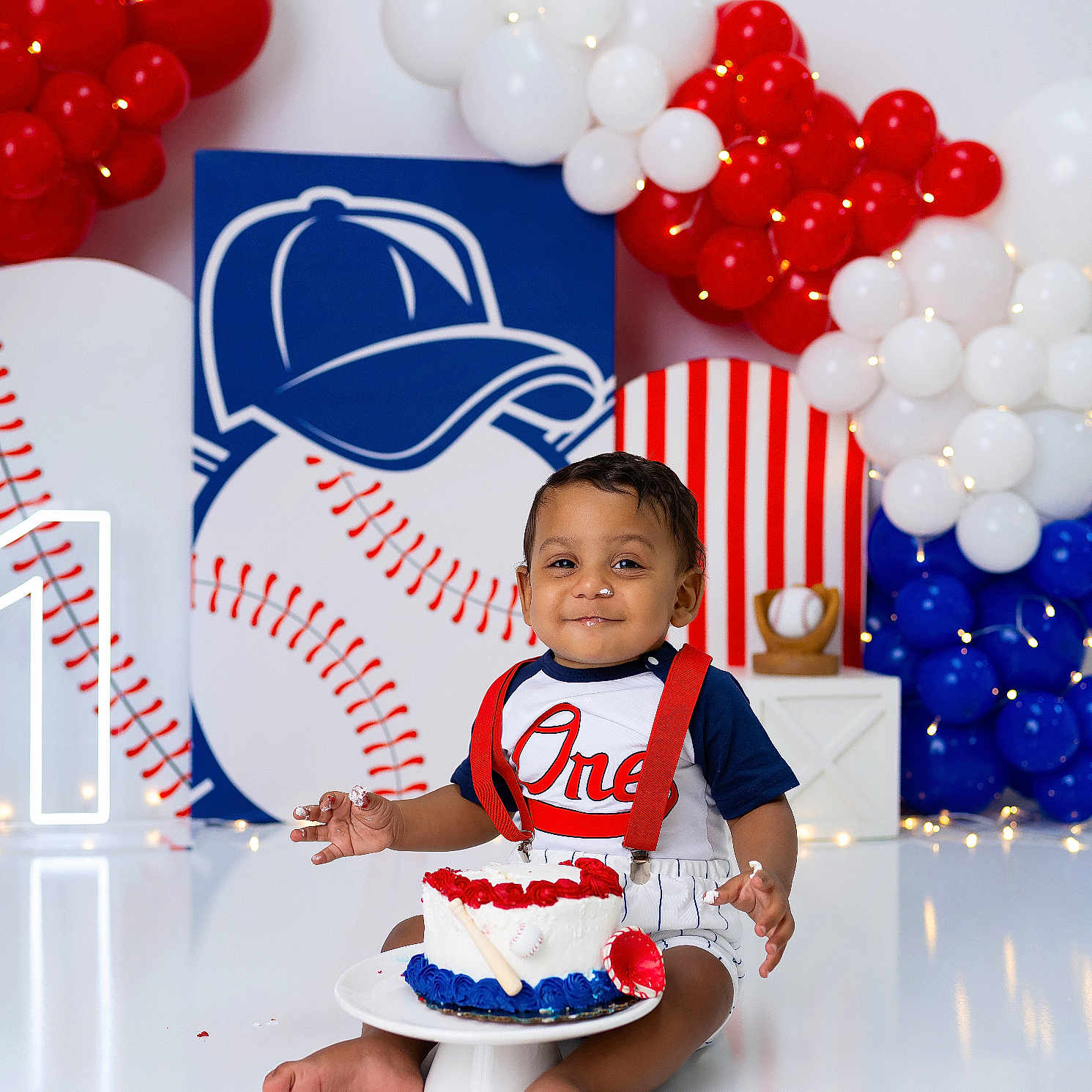 Kashton joined the competition — help win amazing prizes! baby, boy, cake, birthday, first_birthday, baseball, balloons, red, white, blue, celebration, smiling, face, hands, floor, decorations, sitting, party, festive, cute