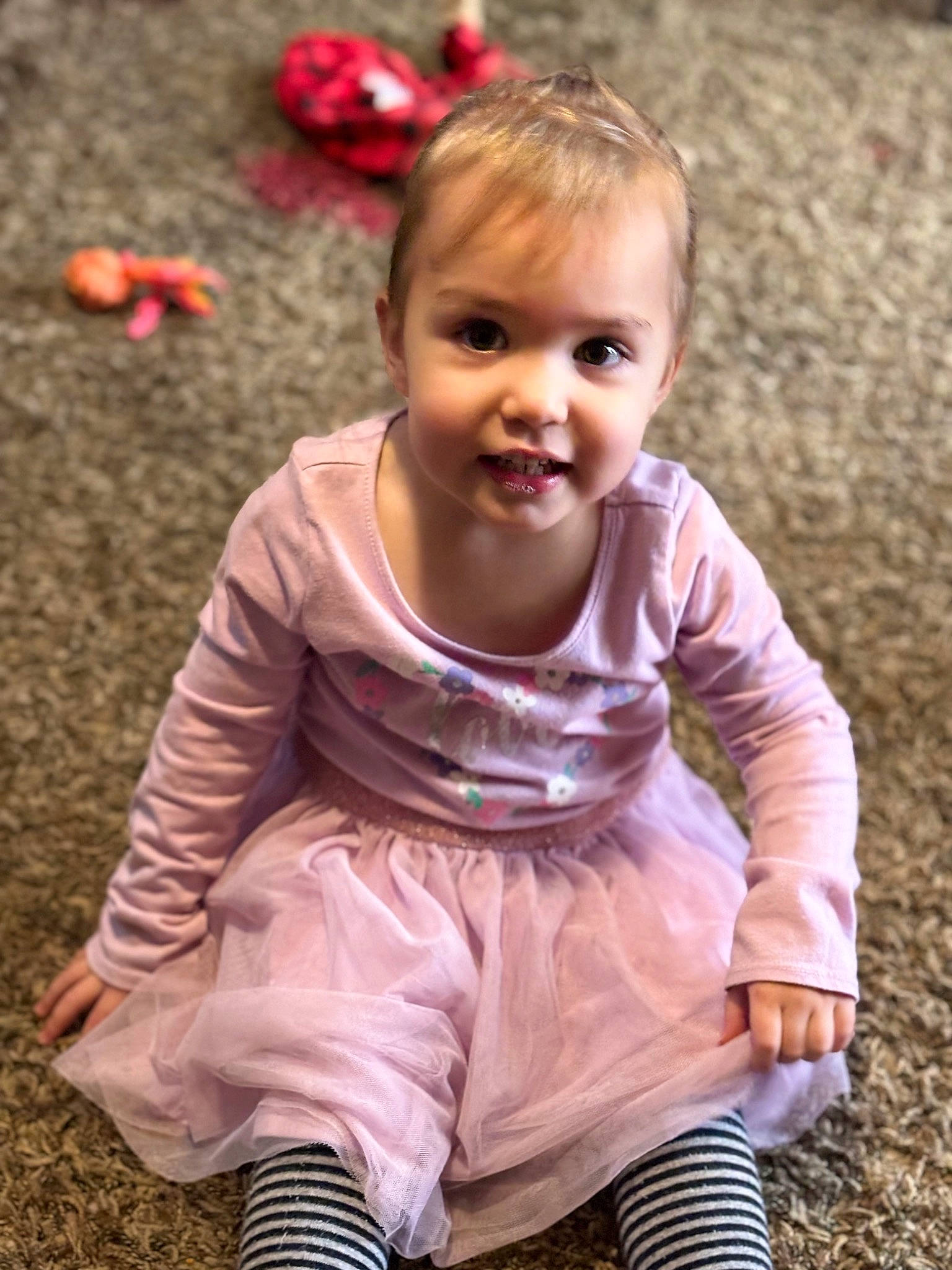 Lumeda is registered to the contest to win money with this photo: baby, baby_toddler_clothing, beauty, cheek, child, face, grass, happy, iris, mammal, people, people_in_nature, person, photograph, pink, plant, sitting, skin, sleeve, smile