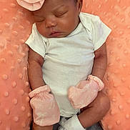 Avah-Grace joined the competition — help win amazing prizes! baby, child, closeup, comfortable, cozy, cushion, cute, flower, headband, indoors, infant, mittens, newborn, peaceful, pink, portrait, resting, sleeping, soft_texture, white_onesie