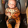 Amron a rejoint le concours — aidez-le/la à gagner de superbes lots ! baby, infant, car_seat, onesie, clothing, child, face, seat, safety, indoor, cute, pattern, colorful, hands, footed_pajamas, expression, head, young, person, comfort