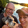 Ripp joined the competition — help win amazing prizes! man, woman, dog, smiling, glasses, hat, lake, sunset, water, reflection, trees, outdoor, nature, portrait, happy, people, animal, pet, casual, sunlight
