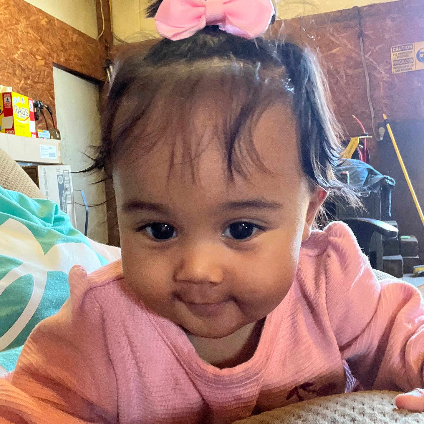 Zarie is registered to the contest to win money with this photo: accessories, baby, bed, bedroom, clothing, cushion, face, furniture, hair, happy, head, homedecor, indoors, interiordesign, person, photography, portrait, room, smile, t_shirt