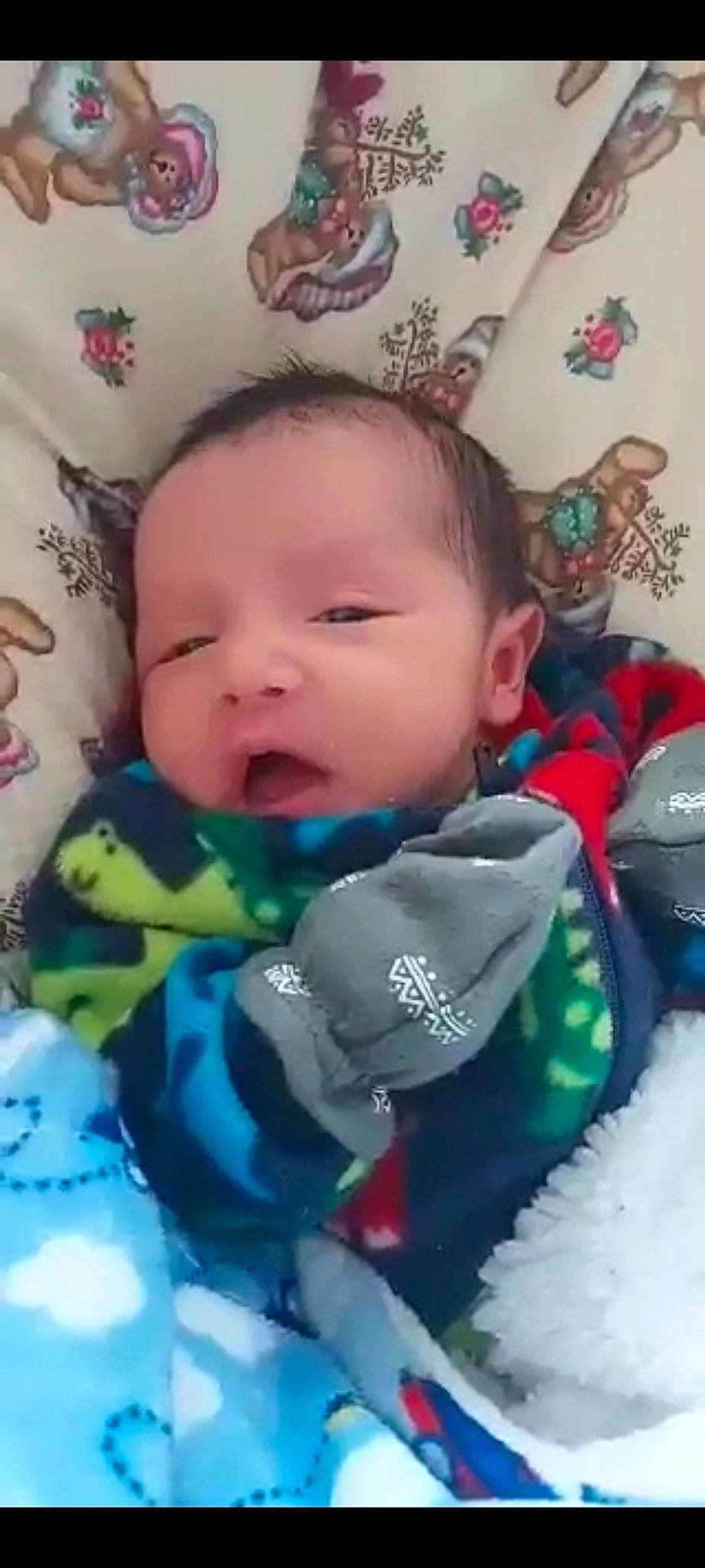 Ricardo is registered to the contest to win money with this photo: baby, baby_toddler_clothing, cheek, child, comfort, face, fun, happy, head, iris, linens, mouth, nose, organ, person, pink, product, room, skin, textile