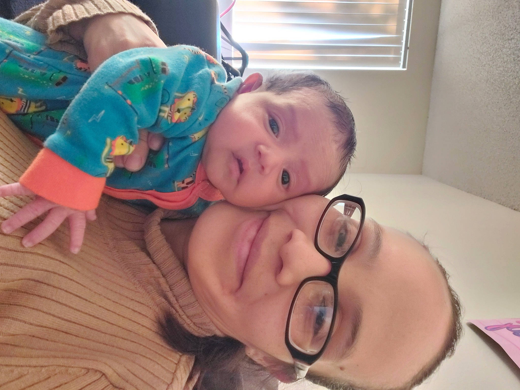 Ricardo is registered to the contest to win money with this photo: cheek, chin, ear, eyebrow, eyelash, facial_expression, finger, fun, glasses, happy, iris, joy, lip, mouth, nose, organ, person, skin, smile, toddler