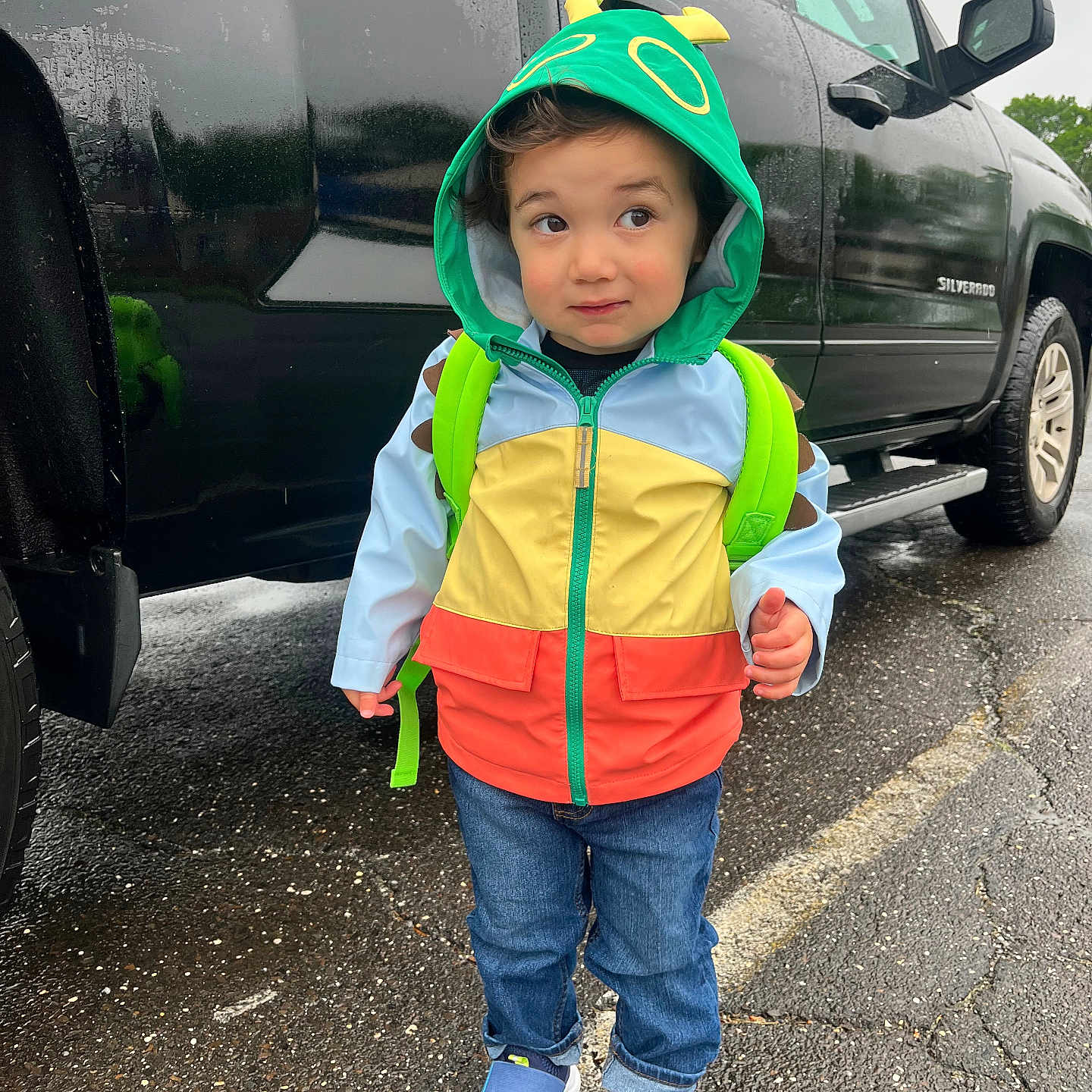 Miles joined the competition — help win amazing prizes! alloywheel, boy, car, carwheel, clothing, coat, face, head, hood, jacket, machine, pants, person, photography, portrait, spoke, tire, transportation, vehicle, wheel