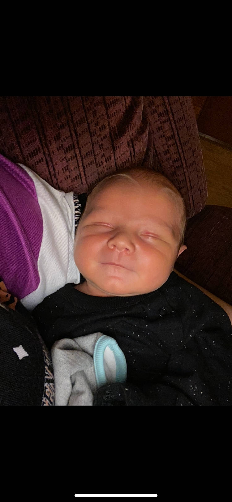 Jiraiya is registered to the contest to win money with this photo: baby, baby_products, baby_toddler_clothing, bedtime, cheek, child, comfort, darkness, electric_blue, eye, finger, head, jacket, linens, mouth, nap, nose, person, skin, sleeve