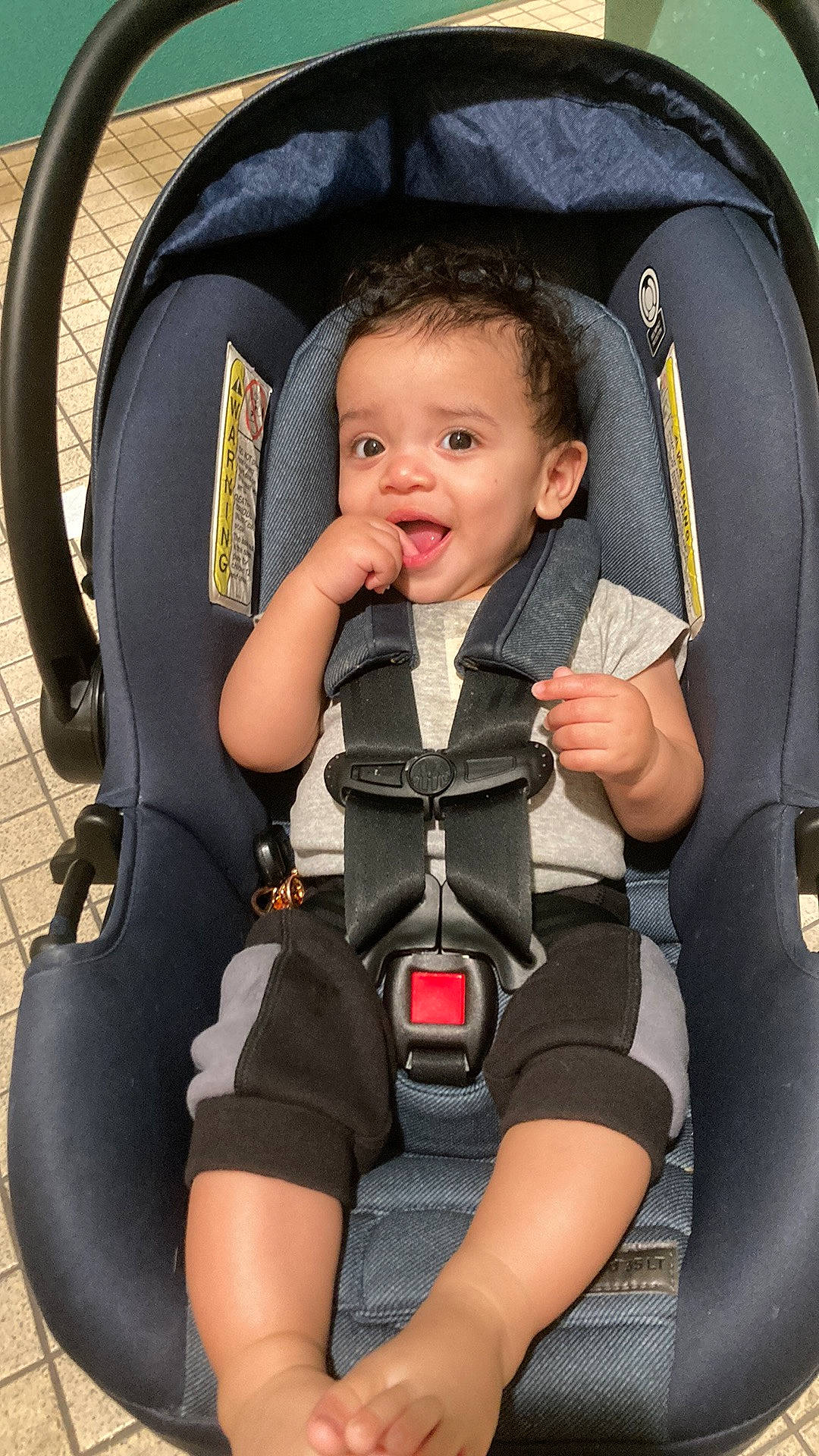 Alijah joined the competition — help win amazing prizes! auto_part, baby, baby_carriage, baby_in_car_seat, baby_products, baby_safety, baby_toddler_clothing, car_seat, chair, child, comfort, fashion_accessory, head_restraint, person, personal_protective_equipment, seat_belt, sitting, smile, thigh, toddler