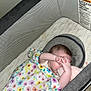 Locklynn is registered to the contest to win money with this photo: baby, bassinet, blanket, colorful, floral, hands, infant, mesh, plush_toy, playing, resting, safe, sleeping_area, soft, toy, warning_label, young_child, indoor, cozy, covering_face