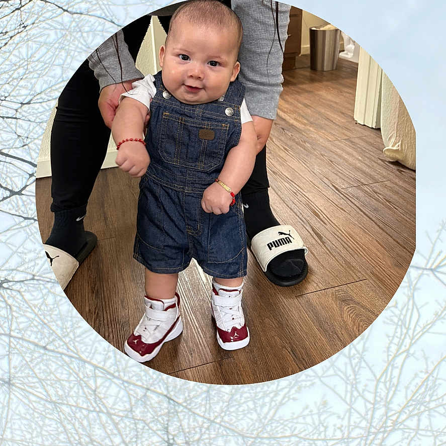 Zaire is registered to the contest to win money with this photo: accessories, baby, bodypart, bracelet, clothing, face, finger, footwear, hardwood, head, jeans, jewelry, pants, person, photography, portrait, shoe, shorts, sneaker, wood