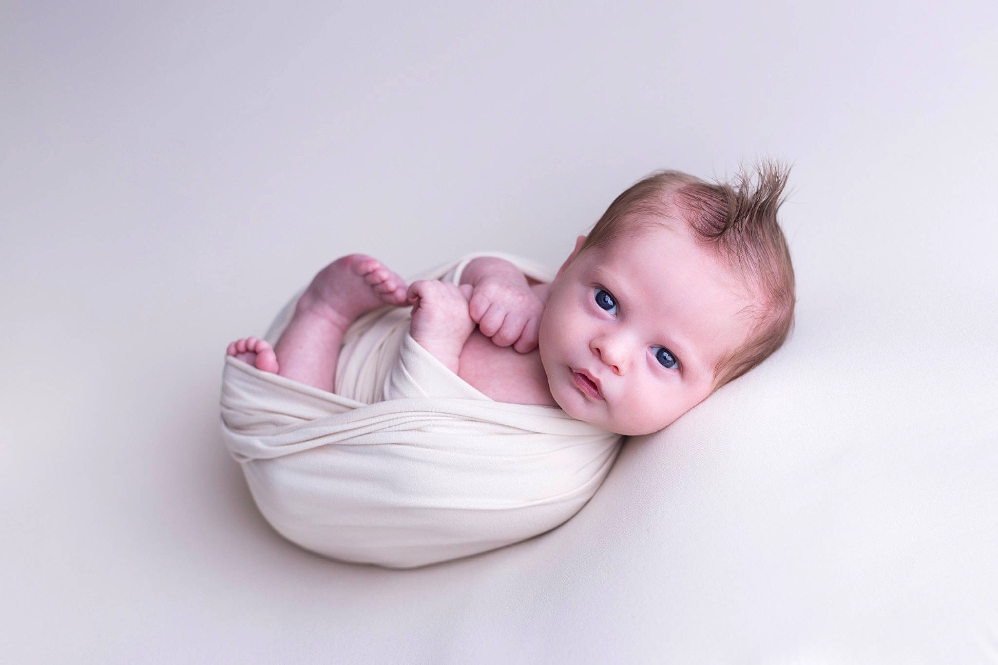Ryker is registered to the contest to win money with this photo: baby, baby_products, baby_safety, baby_sleeping, baby_toddler_clothing, cheek, child, comfort, flash_photography, flooring, happy, linens, person, portrait, portrait_photography, sitting, sleep, toddler, tummy_time, wood