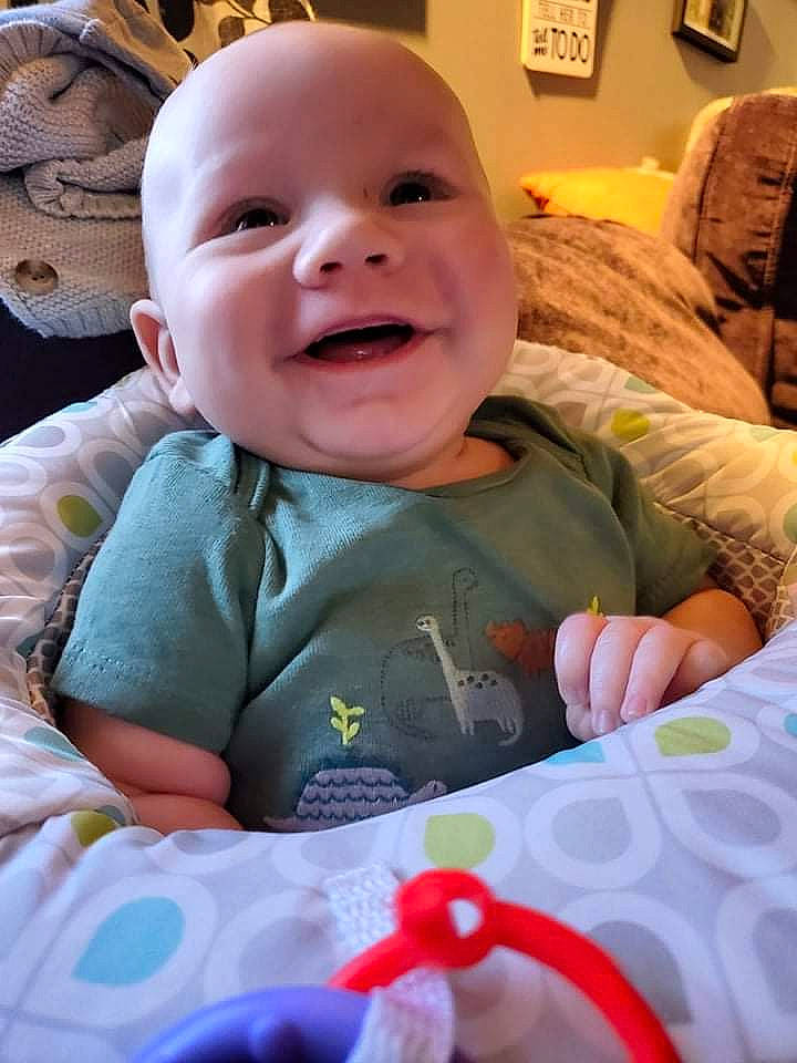 Kash is registered to the contest to win money with this photo: baby, baby_toddler_clothing, cheek, child, comfort, eye, face, happy, head, iris, mouth, nose, organ, people, person, product, skin, smile, textile, toddler