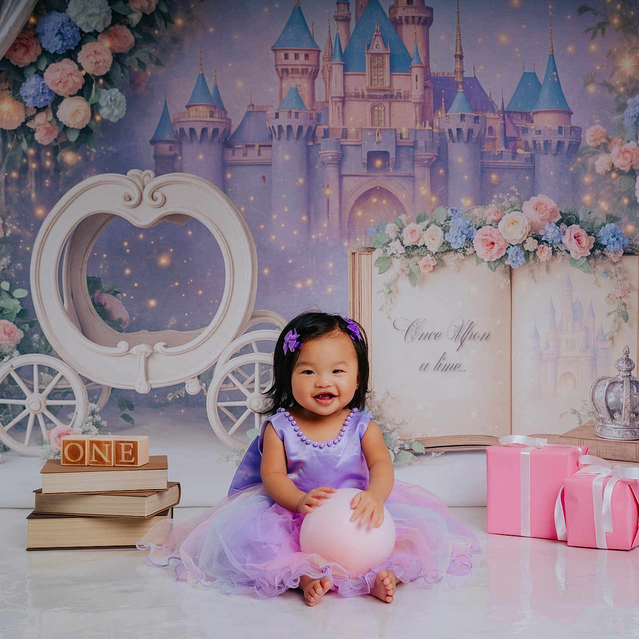 Raeyaa Jhade is registered to the contest to win money with this photo: child, baby, girl, purple_dress, balloon, storybook, castle, carriage, flowers, gifts, curtains, smiling, portrait, sitting, indoors, decorations, pastel_colors, birthday, celebration, happy