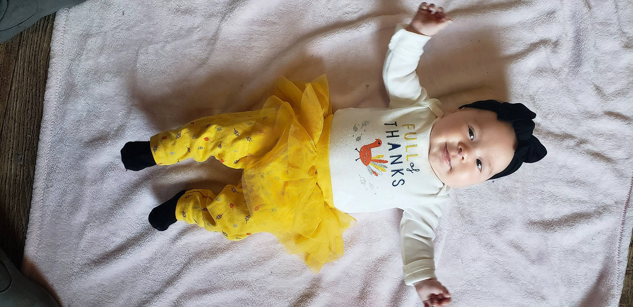Rylynn is registered to the contest to win money with this photo: arm, baby, baby_toddler_clothing, child, comfort, face, flooring, fun, happy, person, room, sleeve, smile, thumb, toddler, toy, vertebrate