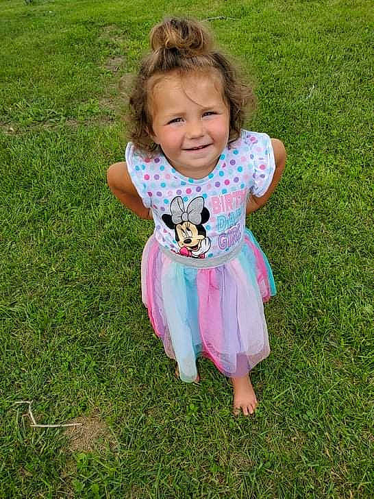 Marlayna joined the competition — help win amazing prizes! baby_toddler_clothing, botany, child, dress, face, grass, grass_family, grassland, groundcover, happy, joy, lawn, leisure, meadow, people_in_nature, person, pink, plant, sleeve, smile