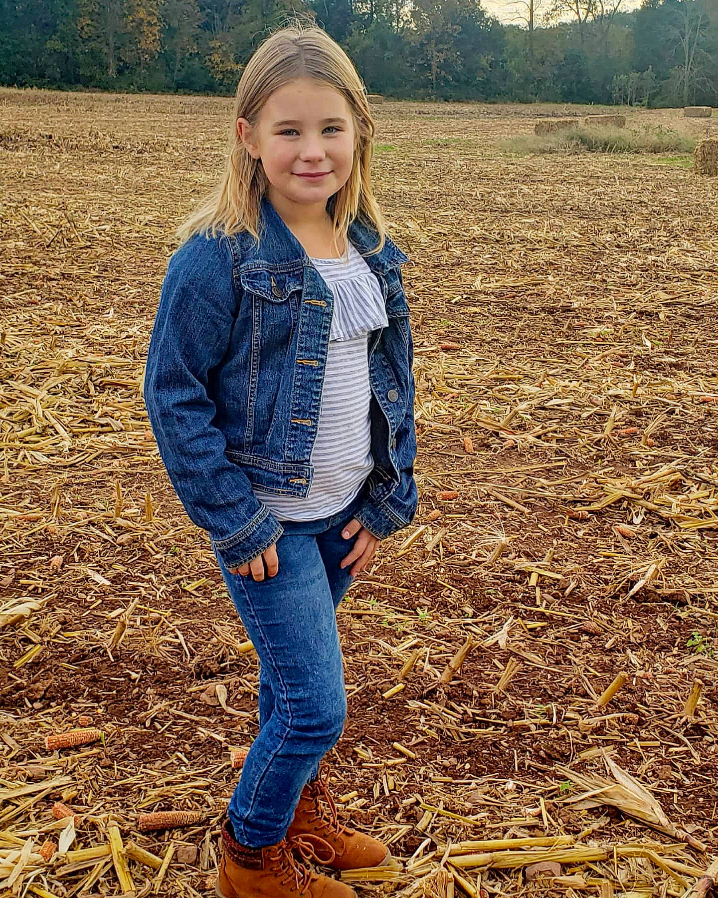 Myla joined the competition — help win amazing prizes! agriculture, beauty, blond, denim, electric_blue, eye, grass, grass_family, grassland, happy, joy, landscape, leaf, outerwear, people_in_nature, person, sleeve, smile, street_fashion, sunlight