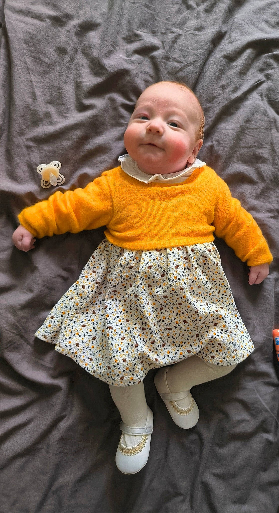 Kaylee participe au concours pour gagner de l'argent avec cette photo : baby, baby_toddler_clothing, child, dress, eye, face, finger, gesture, hand, happy, head, human_body, one_piece_garment, person, photograph, pink, purple, skin, sleeve, textile