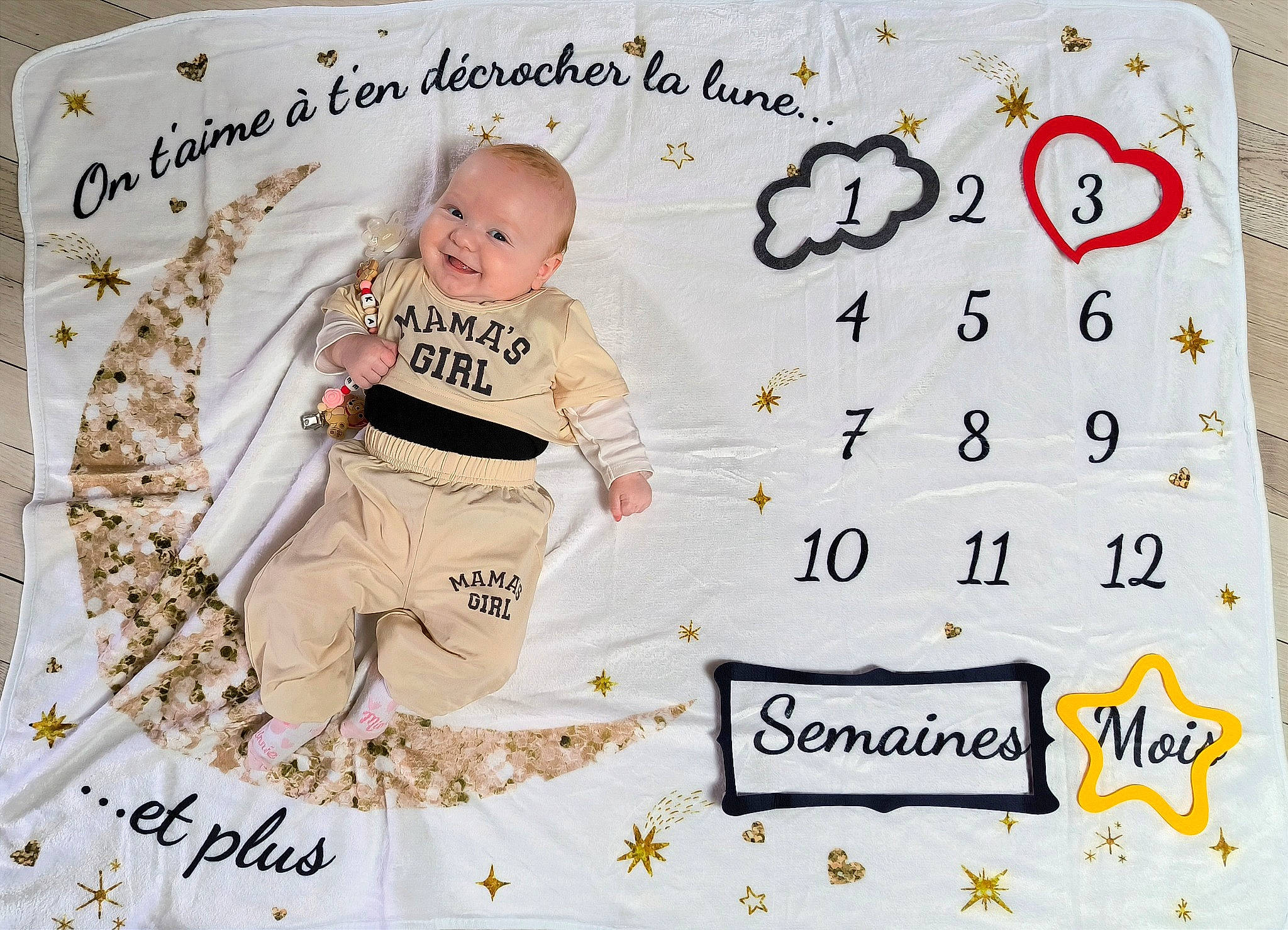 Kaylee participe au concours pour gagner de l'argent avec cette photo : art, baby, baby_toddler_clothing, child, font, football, happy, illustration, joy, linens, logo, paper, paper_product, pattern, person, playing_sports, product, rectangle, sleeve, t_shirt