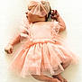 Alice a rejoint le concours — aidez-le/la à gagner de superbes lots ! baby, newborn, sleeping, infant, pink_dress, headband, frills, soft_texture, peaceful, cute, child, portrait, laying_down, tutu, delicate, small_hands, small_feet, white_background, adorable, closeup