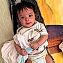 baby, infant, towel, blanket, diaper, shirt, cute, lying_down, clothing, child, bed, soft, hand, face, smiling, indoors, person, young, comfort, playful